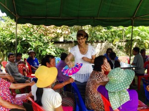 Mary Ellen visiting with the Karen tribe people waiting at the clinic